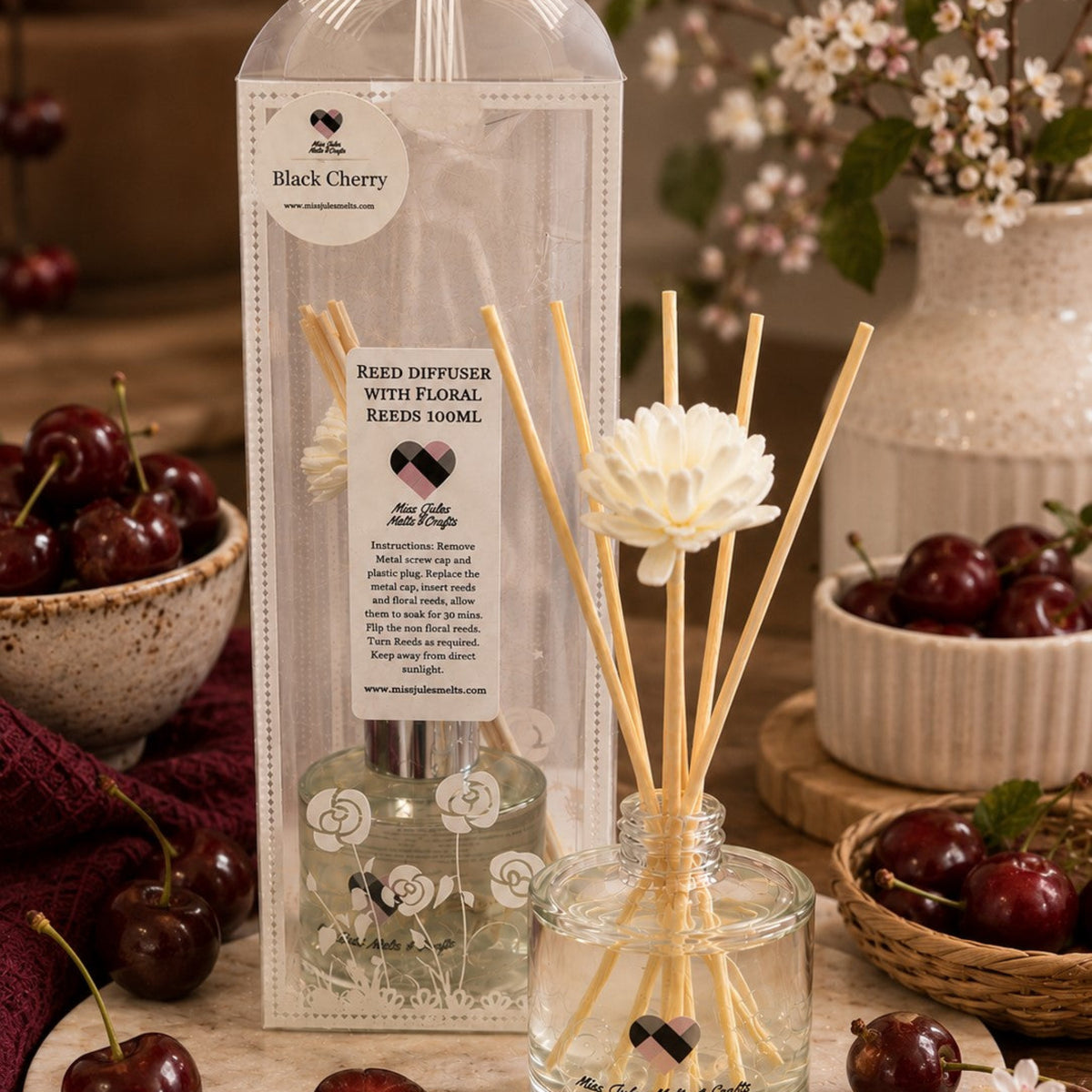 100ml Black Cherry reed diffuser with decorative floral reeds by Miss Jules Melts & Crafts.