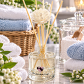 100ml cleaning-inspired reed diffuser with decorative floral reeds by Miss Jules Melts & Crafts.