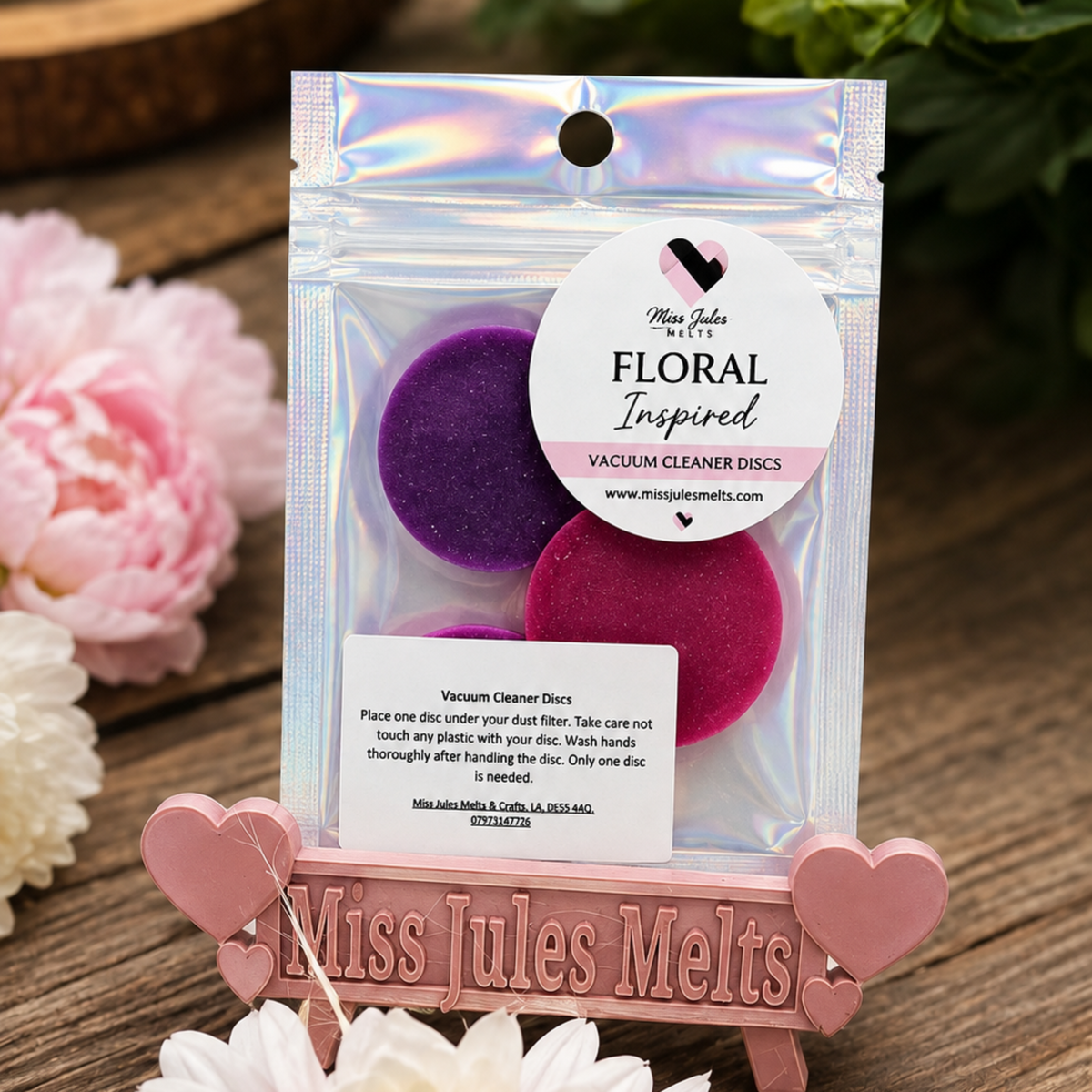 Pack of 2 floral-inspired fragranced vacuum discs by Miss Jules Melts & Crafts.