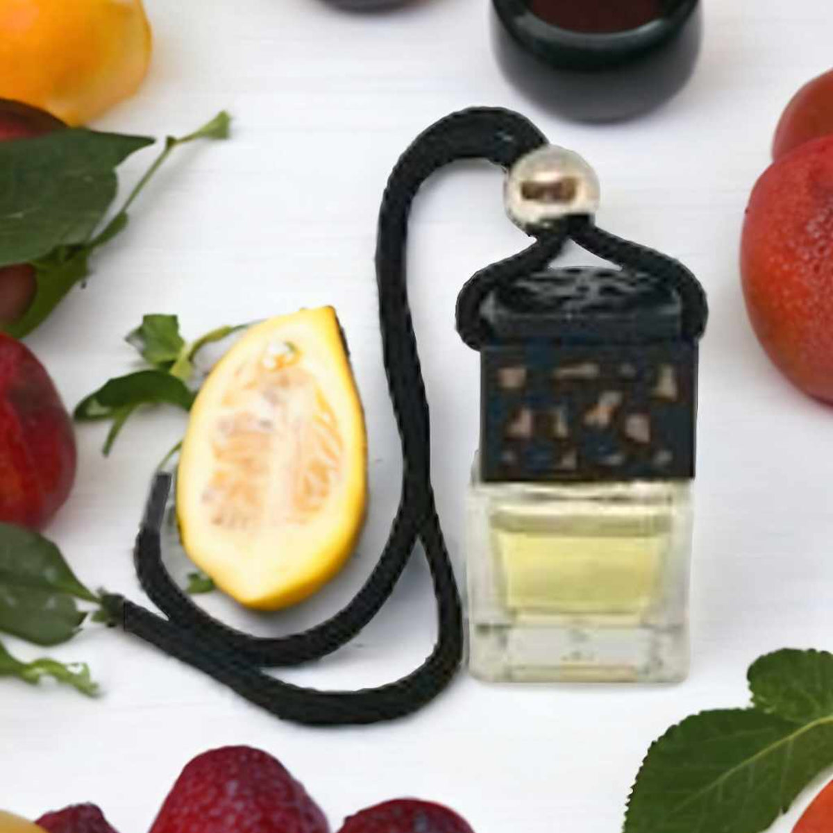 15ml Fruit Inspired Car Diffuser by Miss Jules Melts & Crafts, available in a choice of fruity fragrances.