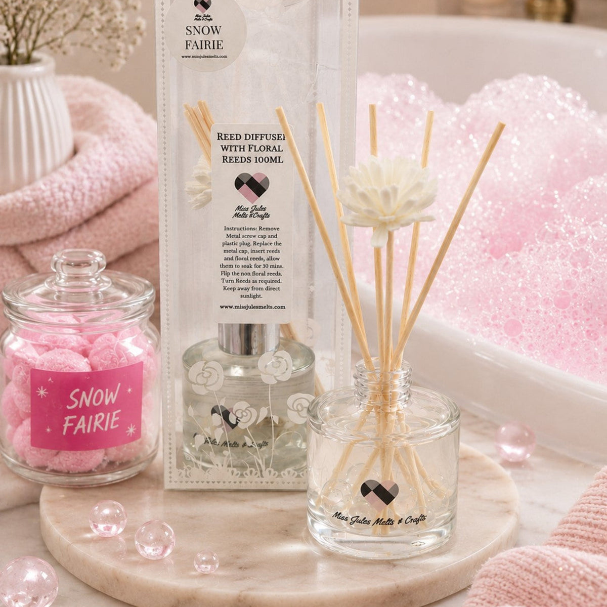 100ml Snow Fairie reed diffuser with decorative floral reeds by Miss Jules Melts & Crafts.
