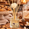 100ml home baking-inspired reed diffuser with decorative floral reeds by Miss Jules Melts & Crafts.